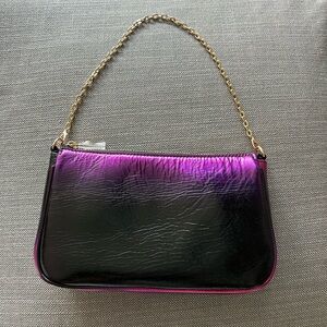 Pochette in a brand new condition